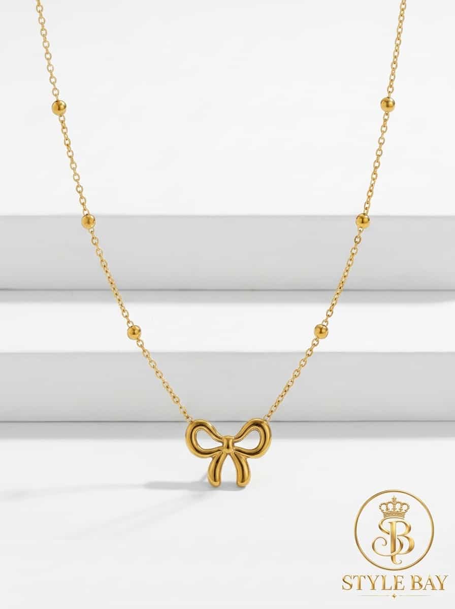 Golden bow pendant necklace